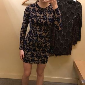 Short tan dress with navy blue velvet pattern